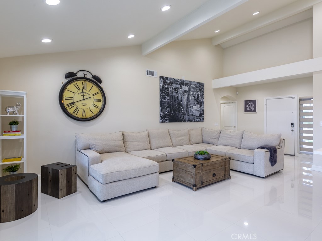 3305 Hawkwood Road Diamond Bar, CA 91765 - Photo 5 of 32 a living room with furniture a wall painting and a wall painting