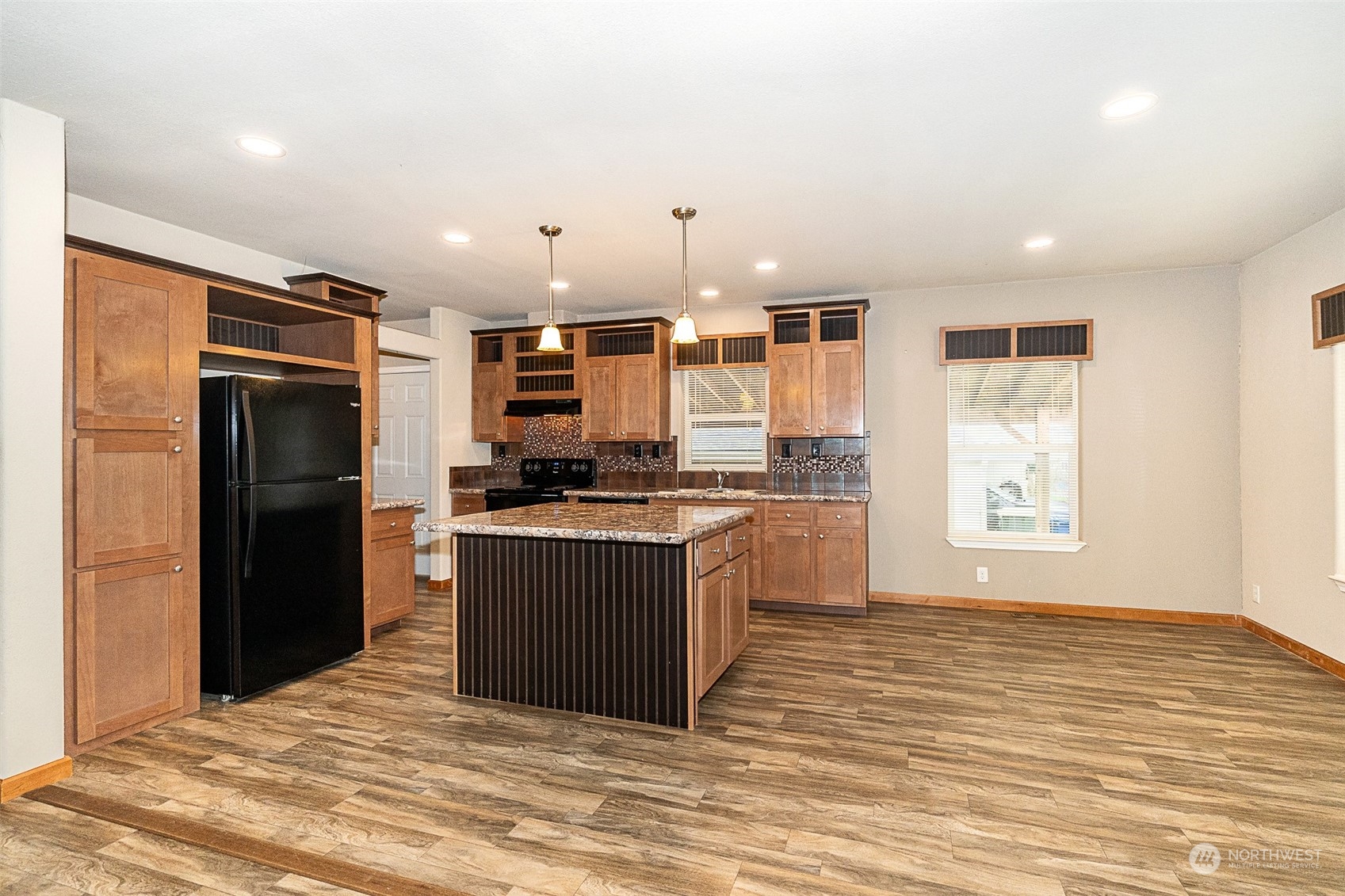 1101 South Scheuber Road, Unit 24 Centralia, WA 98531 - Photo 11 of 29 a kitchen with stainless steel appliances granite countertop a refrigerator and a sink