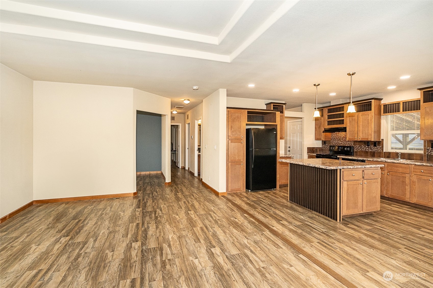 1101 South Scheuber Road, Unit 24 Centralia, WA 98531 - Photo 18 of 29 a open kitchen with stainless steel appliances granite countertop a refrigerator and a sink