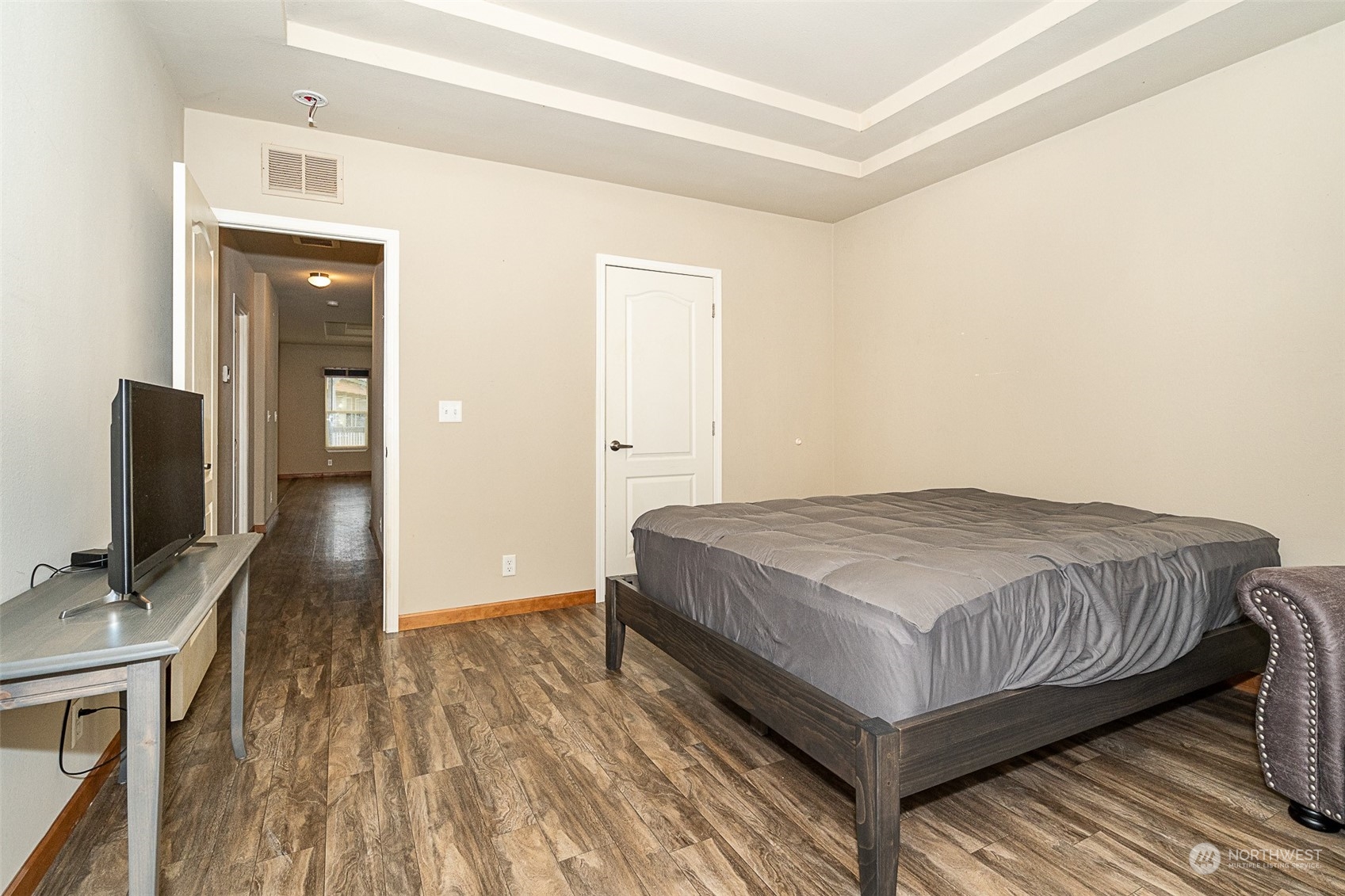 1101 South Scheuber Road, Unit 24 Centralia, WA 98531 - Photo 19 of 29 a bedroom with a bed and a flat screen tv