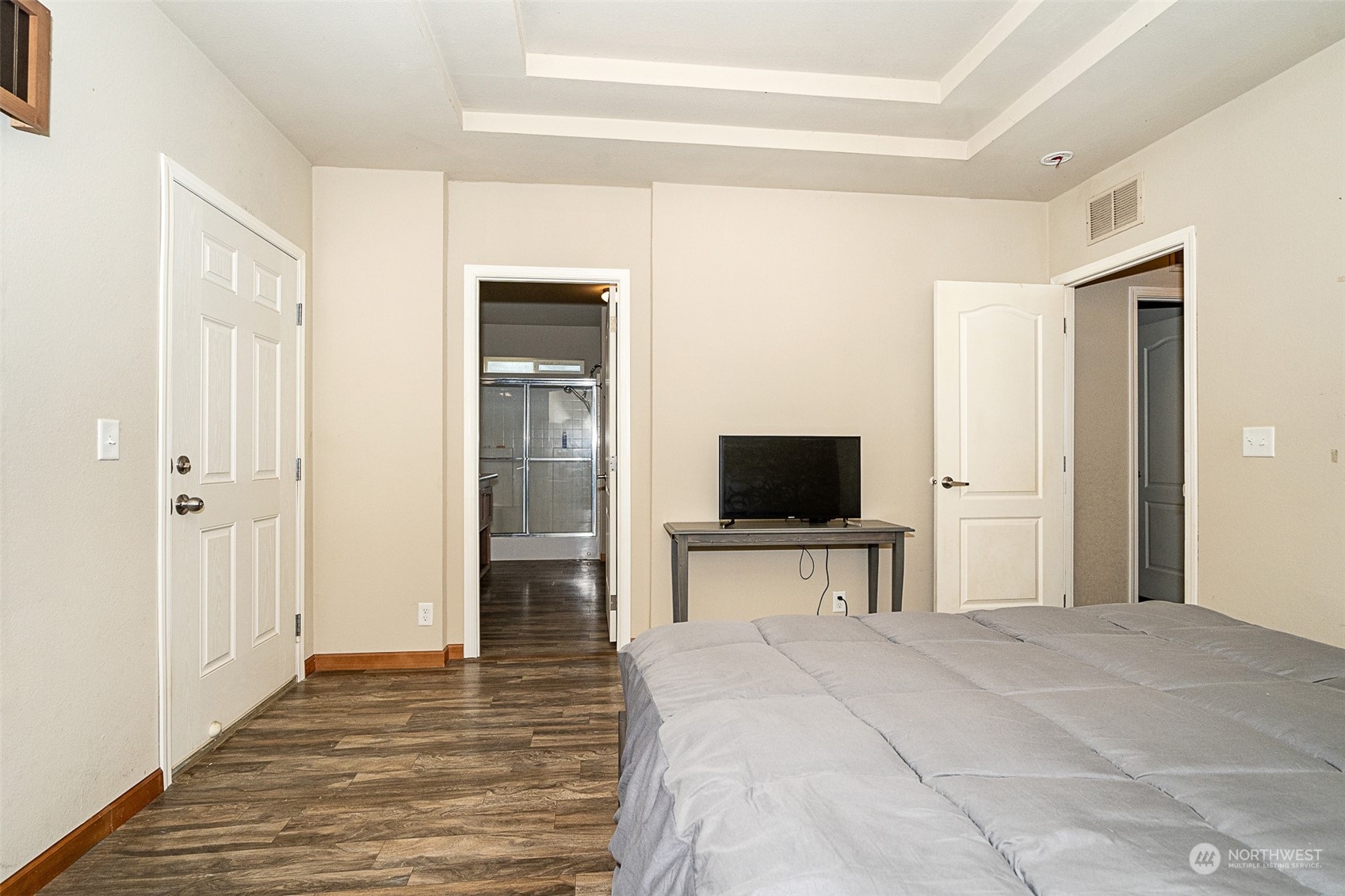 1101 South Scheuber Road, Unit 24 Centralia, WA 98531 - Photo 22 of 29 a bedroom with a bed and a flat screen tv