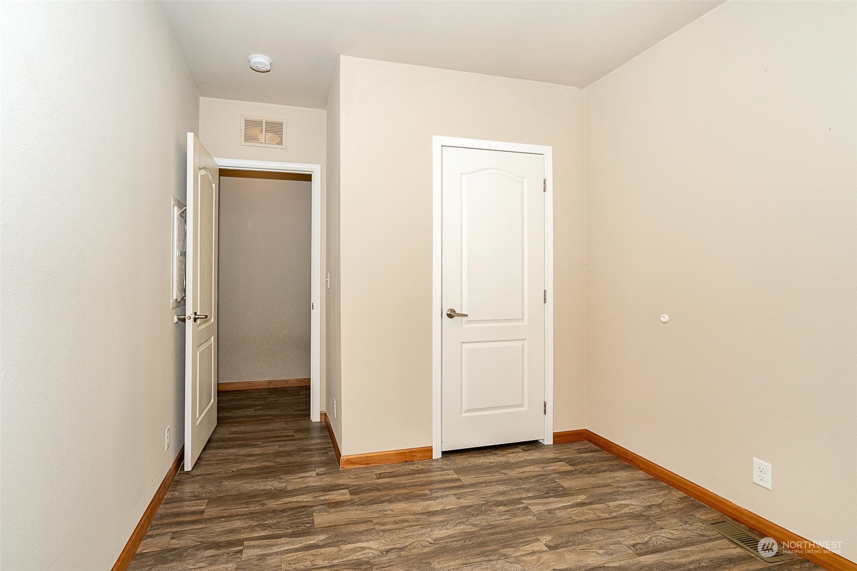 1101 South Scheuber Road, Unit 24 Centralia, WA 98531 - Photo 26 of 29 a view of a hallway with wooden floor