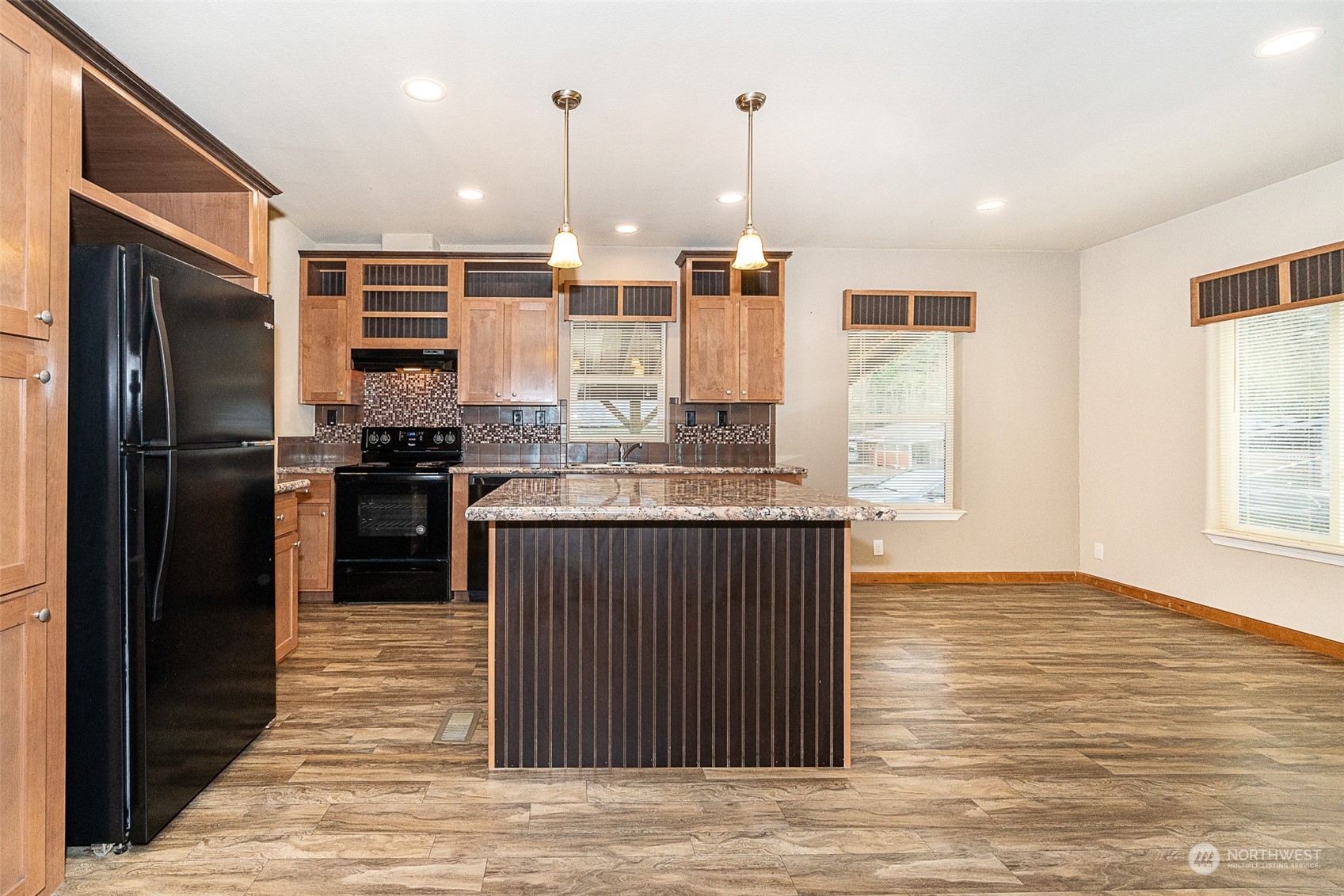 1101 South Scheuber Road, Unit 24 Centralia, WA 98531 - Photo 10 of 29 a kitchen with stainless steel appliances granite countertop a refrigerator a oven a sink and a counter top space
