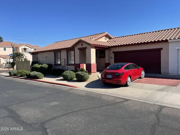 a car parked in front of a house