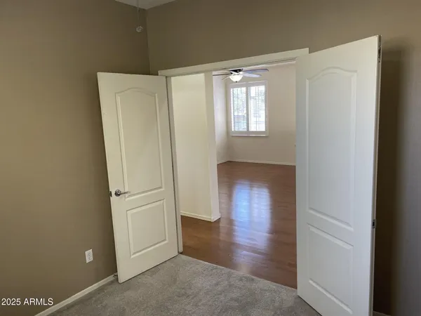 a view of entryway with wooden floor