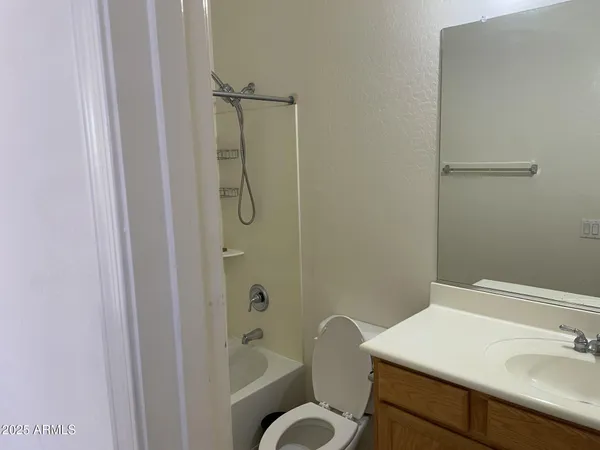 a bathroom with a shower curtain