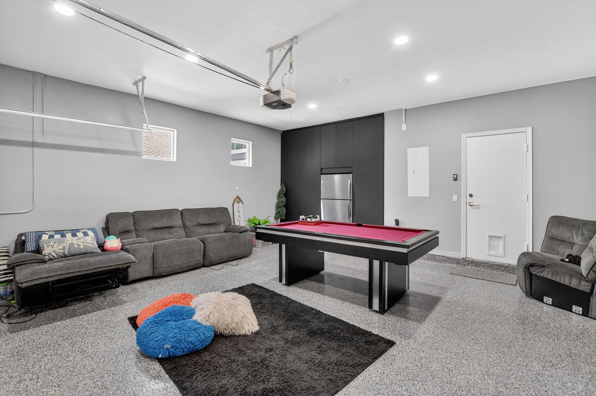 11038 Baybreeze Way Boca Raton, FL 33428 - Photo 30 of 95 a living room with furniture a rug and a chandelier