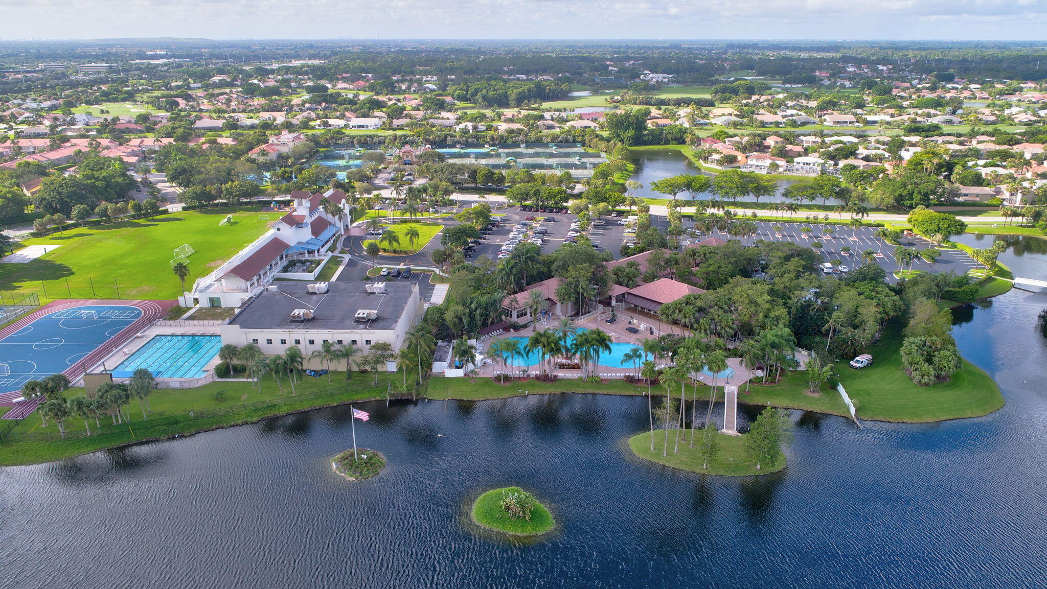 11038 Baybreeze Way Boca Raton, FL 33428 - Photo 3 of 95 an aerial view of residential houses with outdoor space and lake view