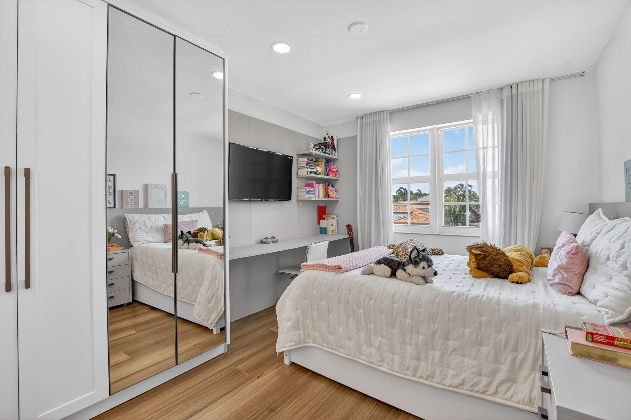 11038 Baybreeze Way Boca Raton, FL 33428 - Photo 55 of 95 a bedroom with a bed and a flat tv screen on the dresser