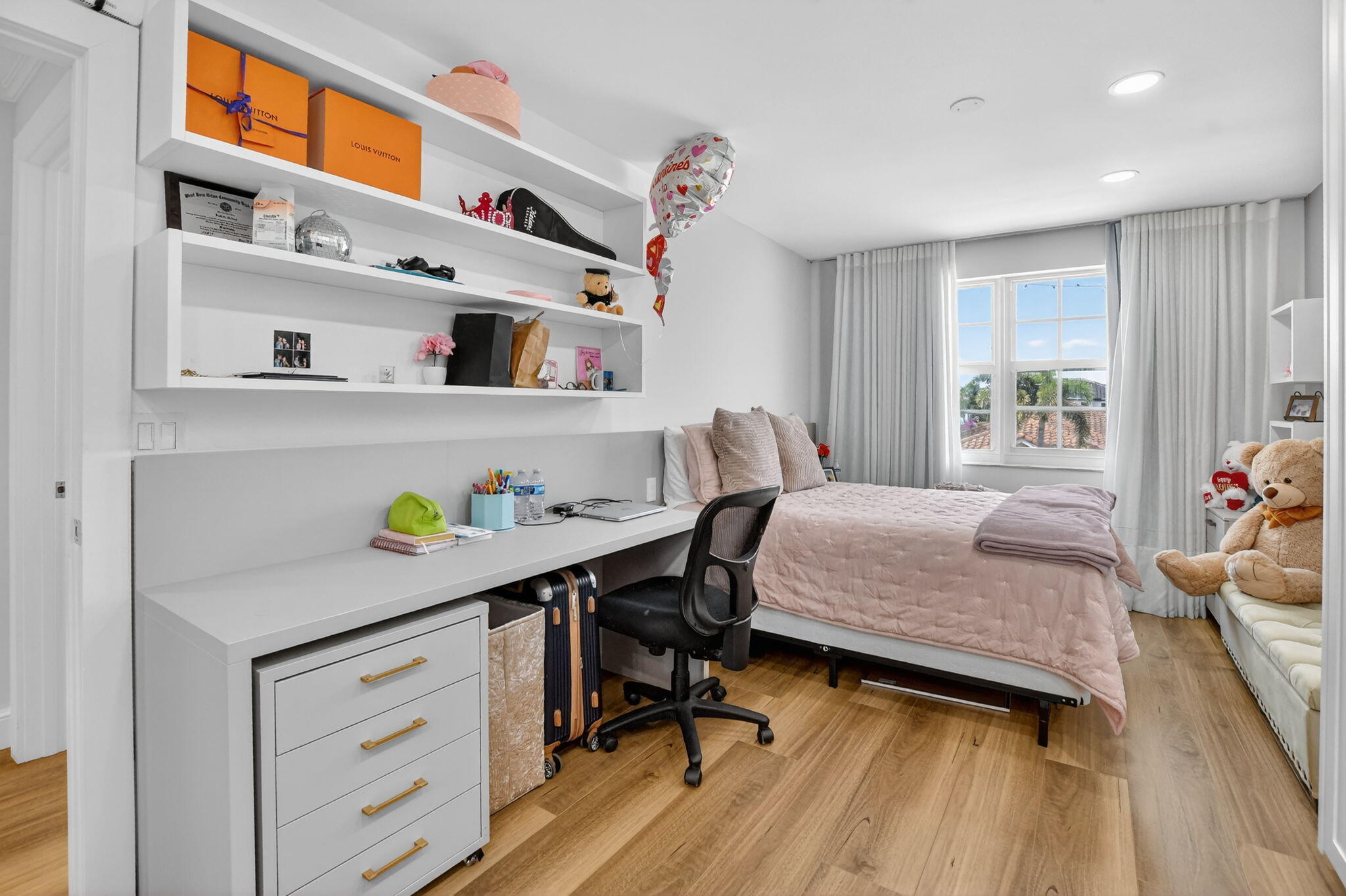 11038 Baybreeze Way Boca Raton, FL 33428 - Photo 62 of 95 a bedroom with a bed and a window