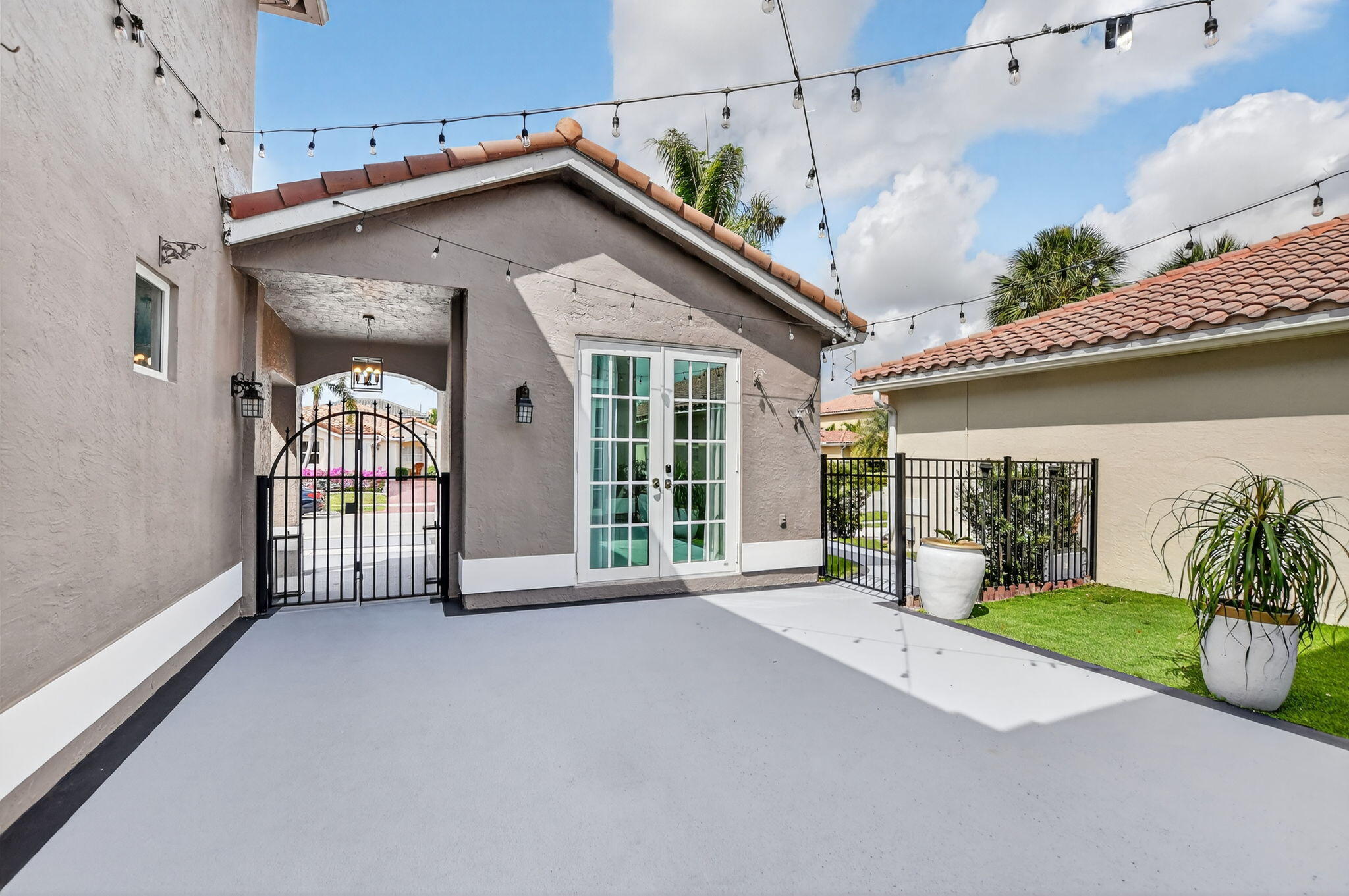 11038 Baybreeze Way Boca Raton, FL 33428 - Photo 78 of 95 a view of a house with porch and garden