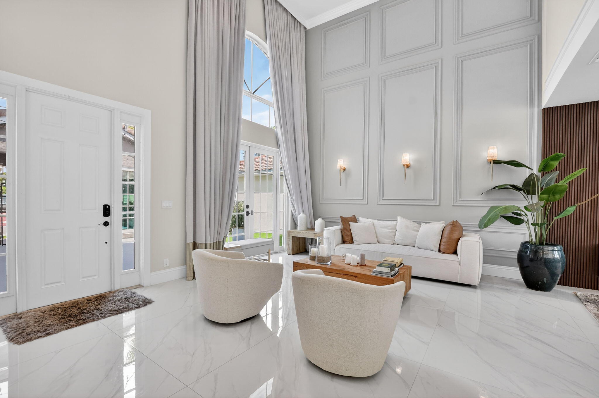 11038 Baybreeze Way Boca Raton, FL 33428 - Photo 8 of 95 a living room with furniture and a potted plant