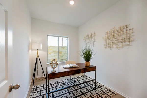 a bathroom with a sink a vanity and a mirror
