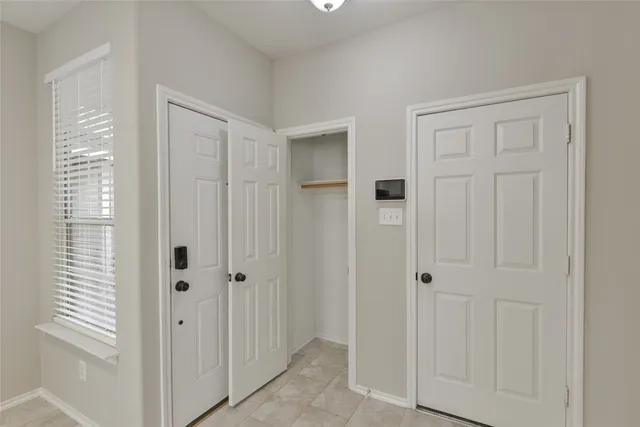 a view of a bathroom with front door