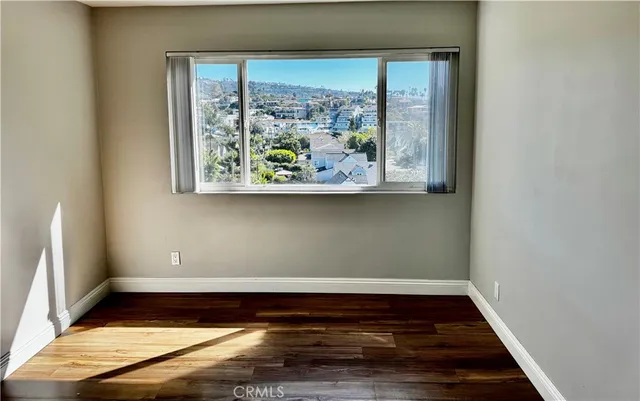 a view of a room with a large window