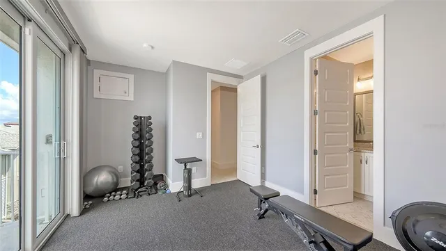 a view of a room with gym equipment