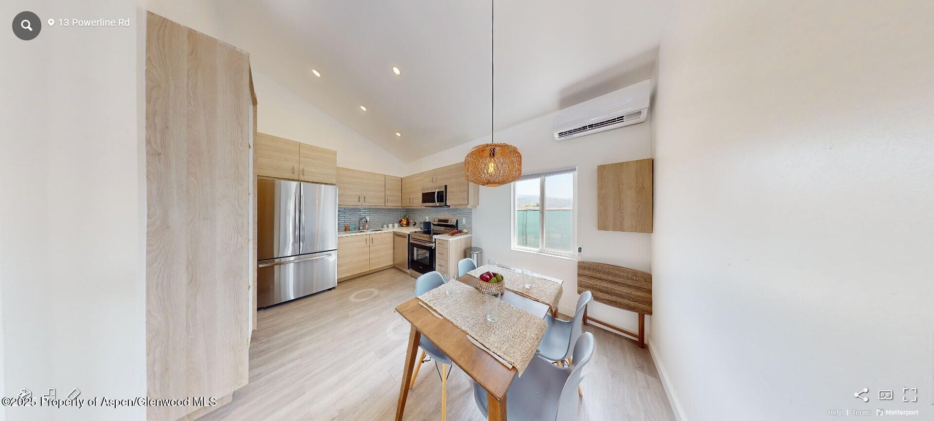 Tbd 14th Street Rifle, CO 81650 - Photo 5 of 14 a kitchen with stainless steel appliances a refrigerator and a stove top oven