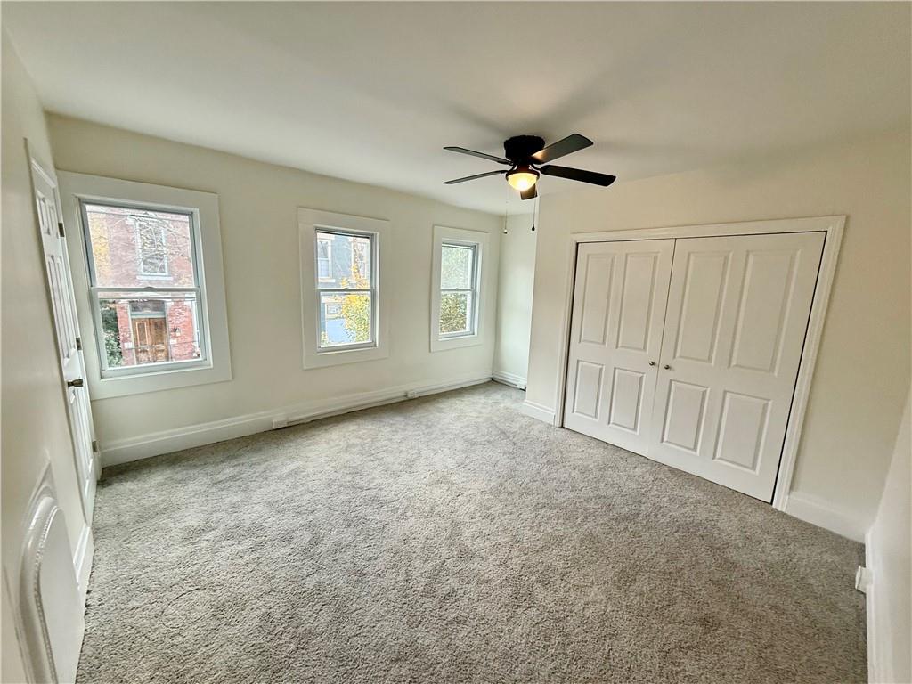 1407 Monterey Street Pittsburgh, PA 15212 - Photo 8 of 16 a view of empty room with windows