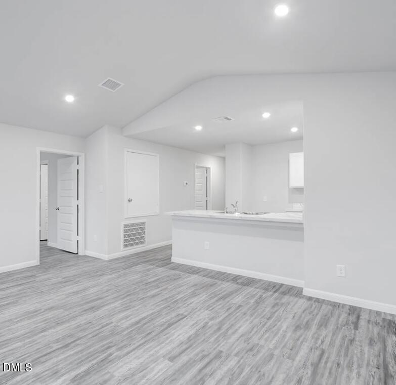 119 Payton Place Roxboro, NC 27573 - Photo 3 of 8 a view of an empty room with wooden floor