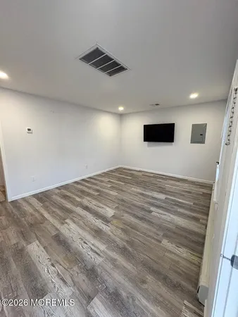 a view of a livingroom with a flat screen tv