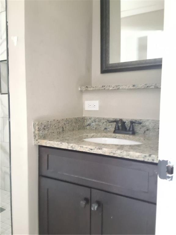 217 Bellview Street Winder, GA 30680 - Photo 4 of 10 a view of a sink and a mirror