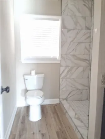 a bathroom with a toilet