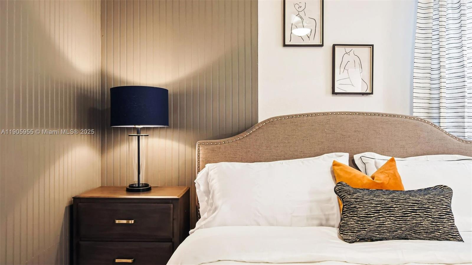 2993 Protagonist Street Kissimmee, FL 34746 - Photo 11 of 31 a bedroom with a bed and painting on the wall