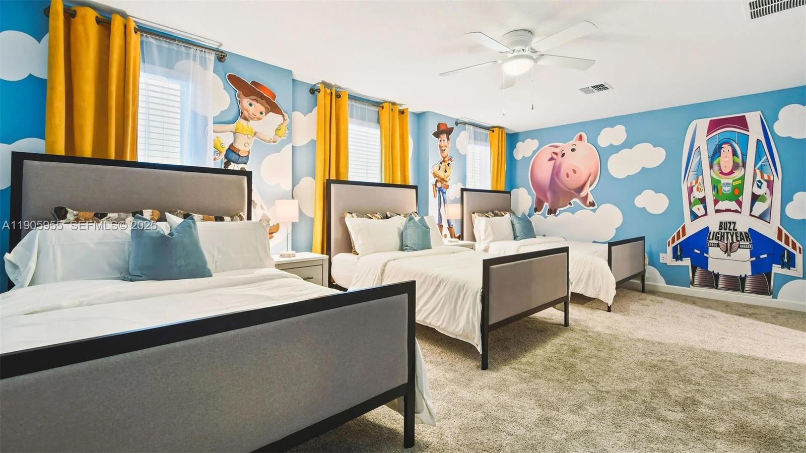 2993 Protagonist Street Kissimmee, FL 34746 - Photo 13 of 31 a living room with furniture and a flat screen tv