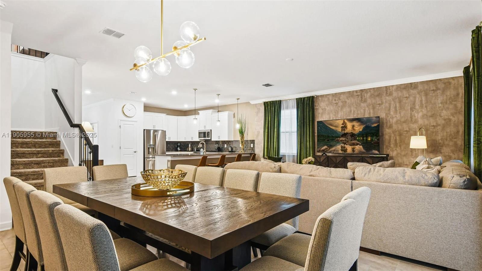 2993 Protagonist Street Kissimmee, FL 34746 - Photo 5 of 31 a view of a dining room with furniture