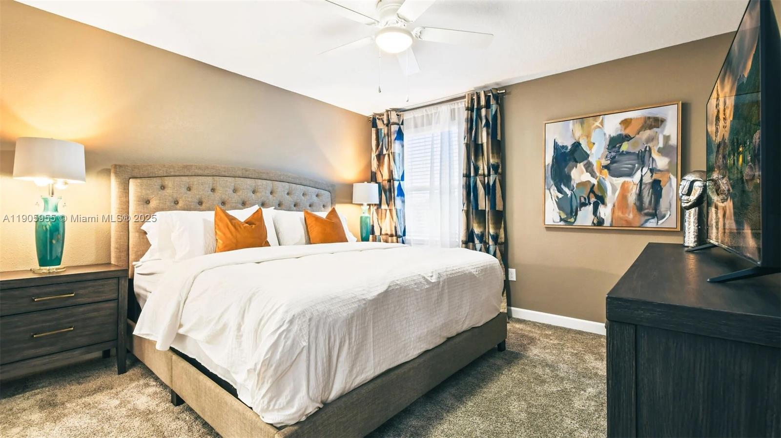 2993 Protagonist Street Kissimmee, FL 34746 - Photo 9 of 31 a bed room with a bed and a desk