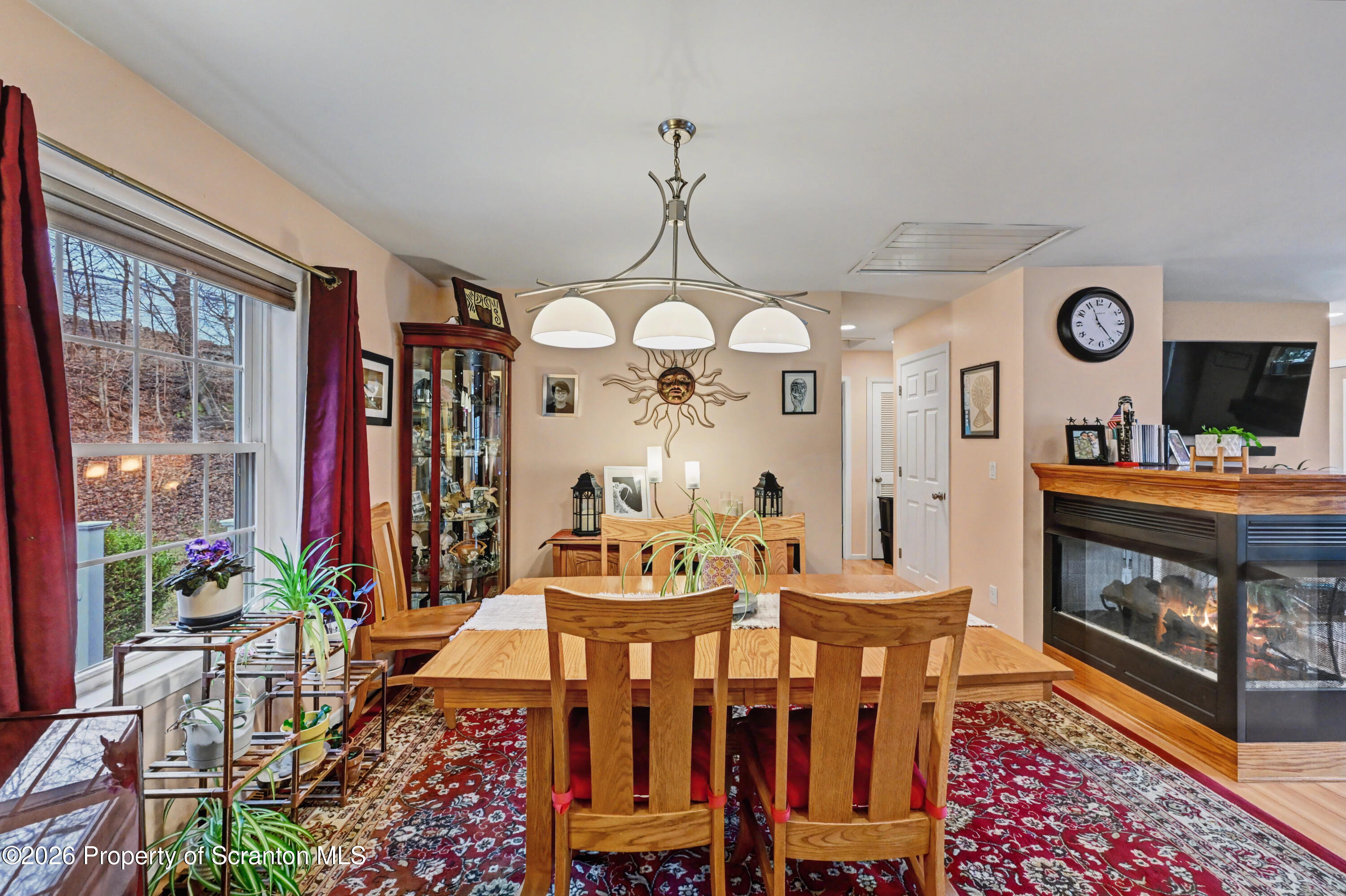 131 Front Street Jessup, PA 18434 - Photo 14 of 58 a view of a dining room with furniture window and wooden floor