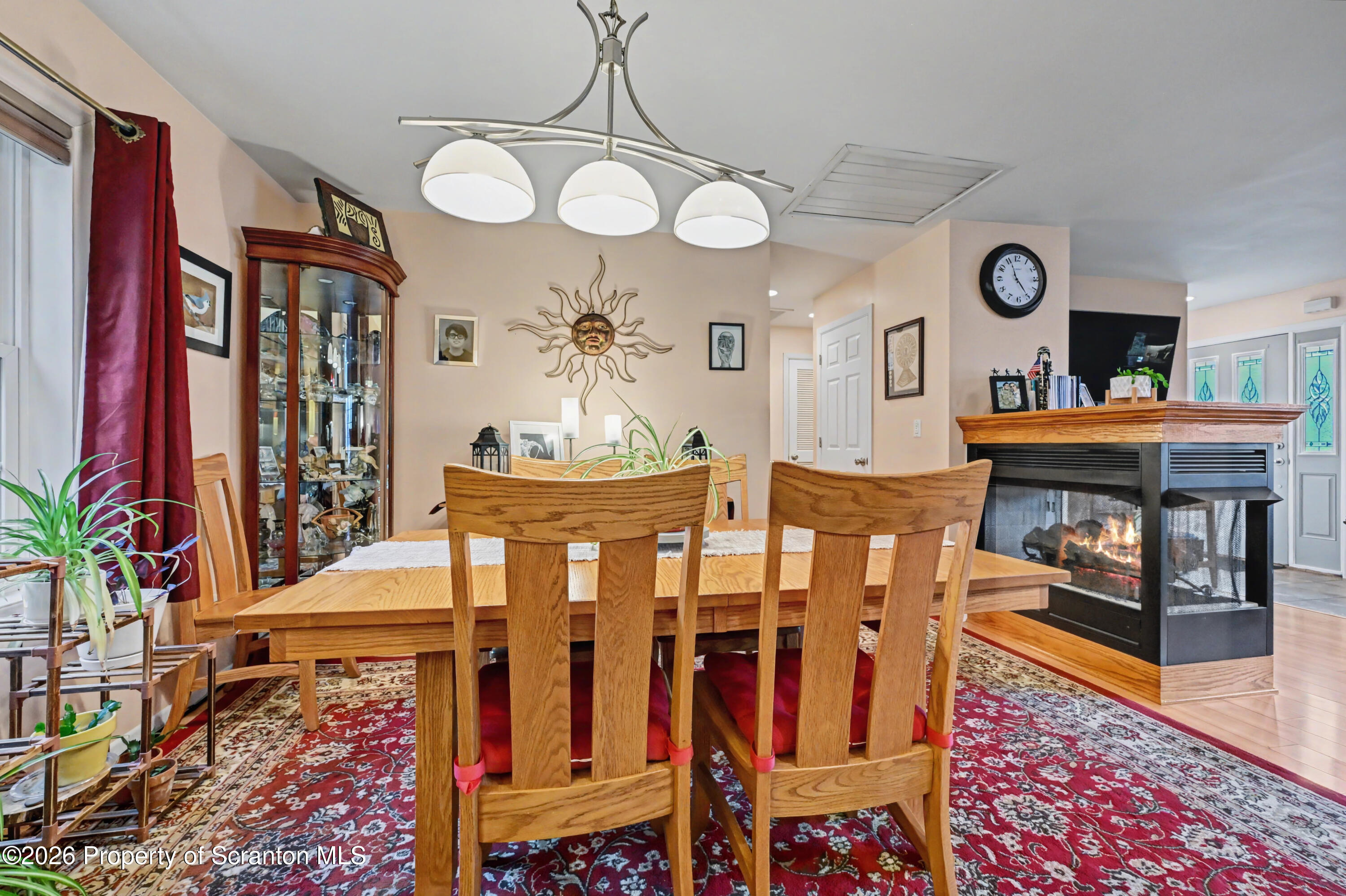 131 Front Street Jessup, PA 18434 - Photo 15 of 58 a view of a dining room with furniture and wooden floor