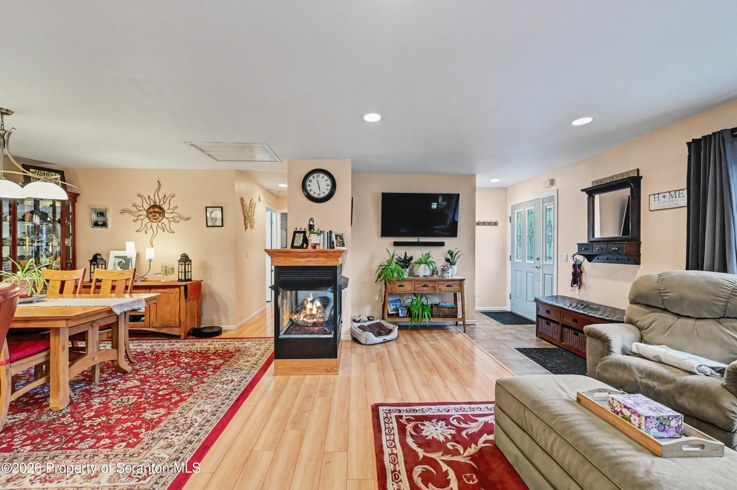 131 Front Street Jessup, PA 18434 - Photo 23 of 58 a living room with furniture and a flat screen tv