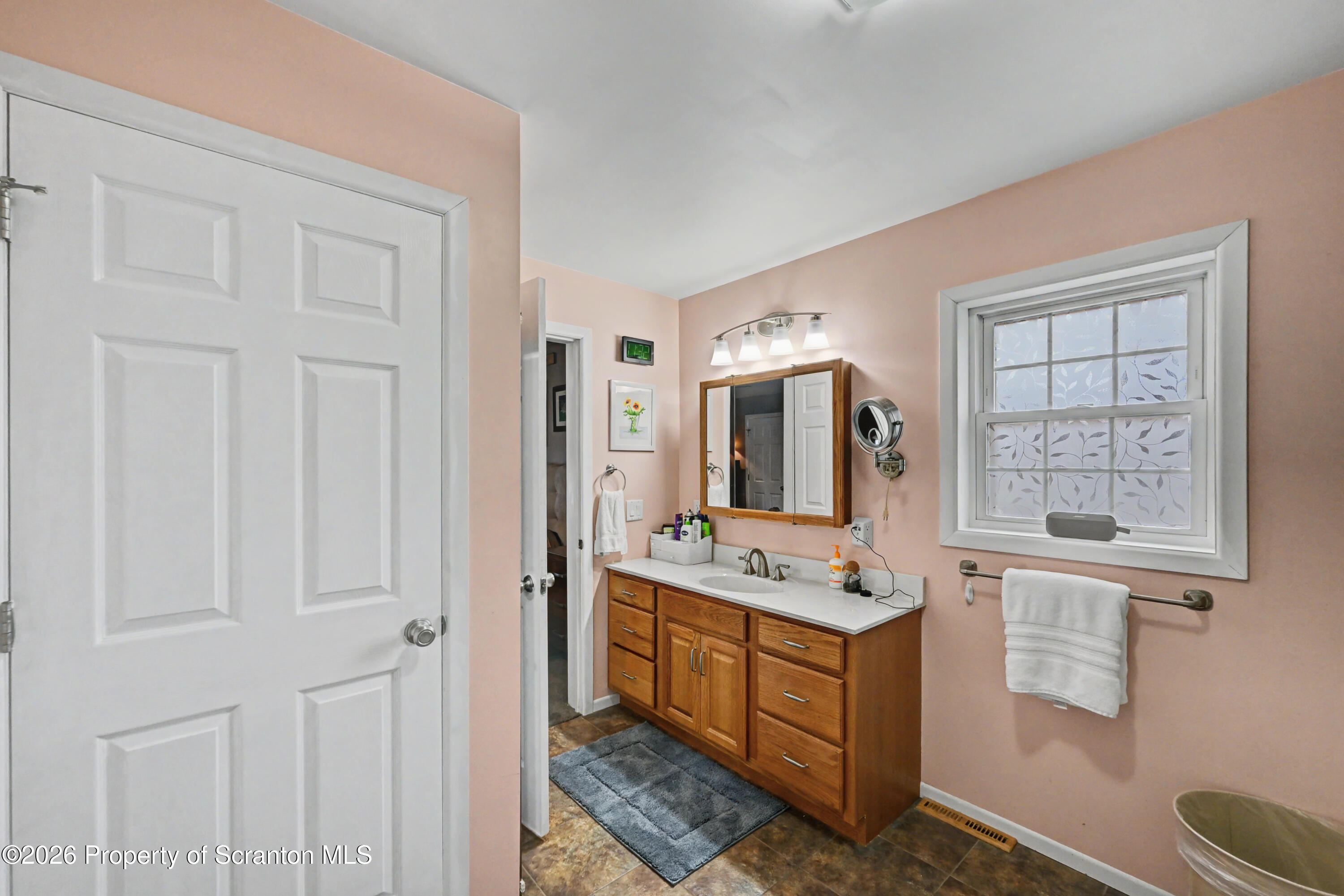 131 Front Street Jessup, PA 18434 - Photo 28 of 58 a room with cabinets and window