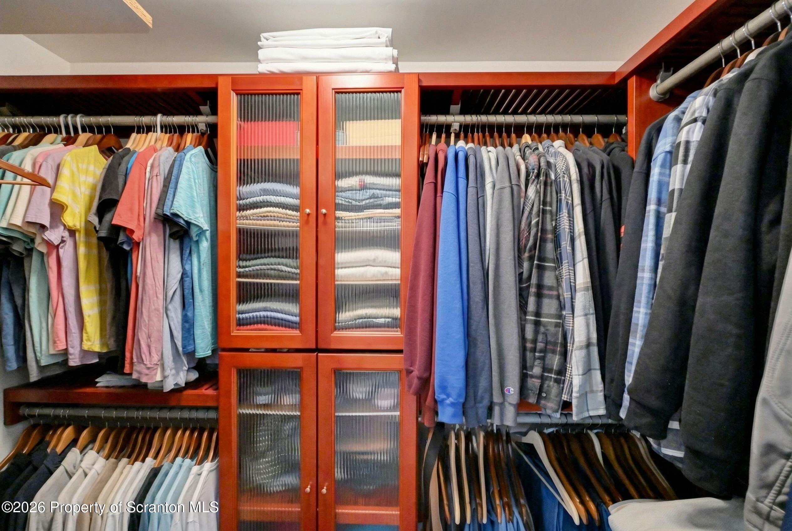 131 Front Street Jessup, PA 18434 - Photo 29 of 58 a view of walk in closet with clothes and shoes