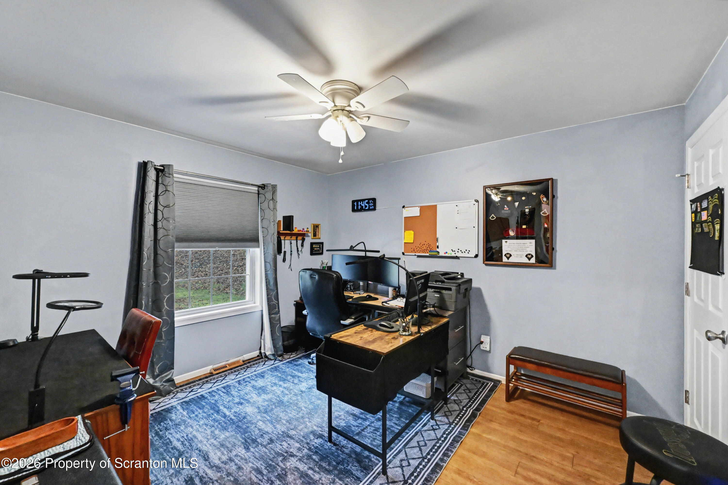 131 Front Street Jessup, PA 18434 - Photo 30 of 58 a living room with furniture and a window