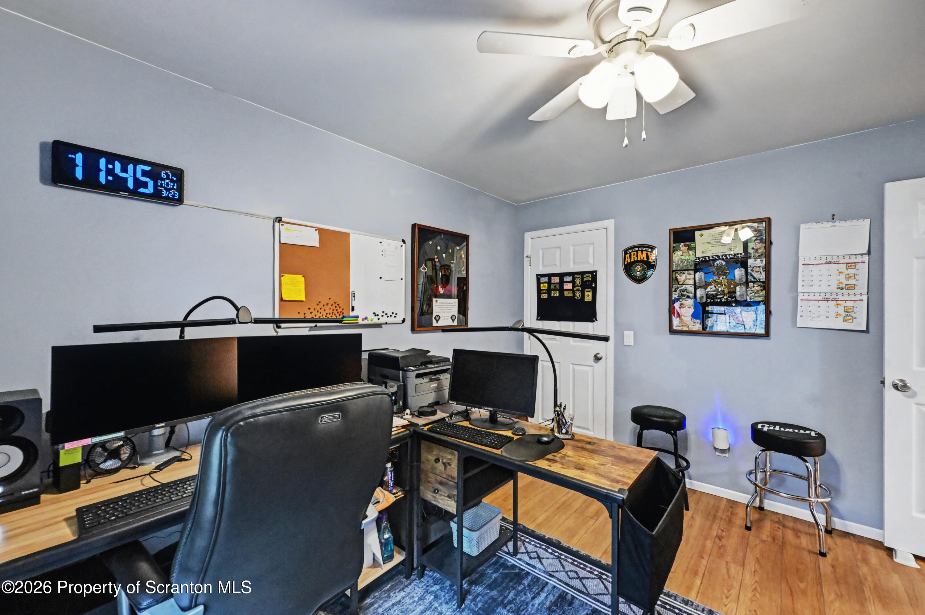 131 Front Street Jessup, PA 18434 - Photo 31 of 58 a view of a workspace with a window and a couch