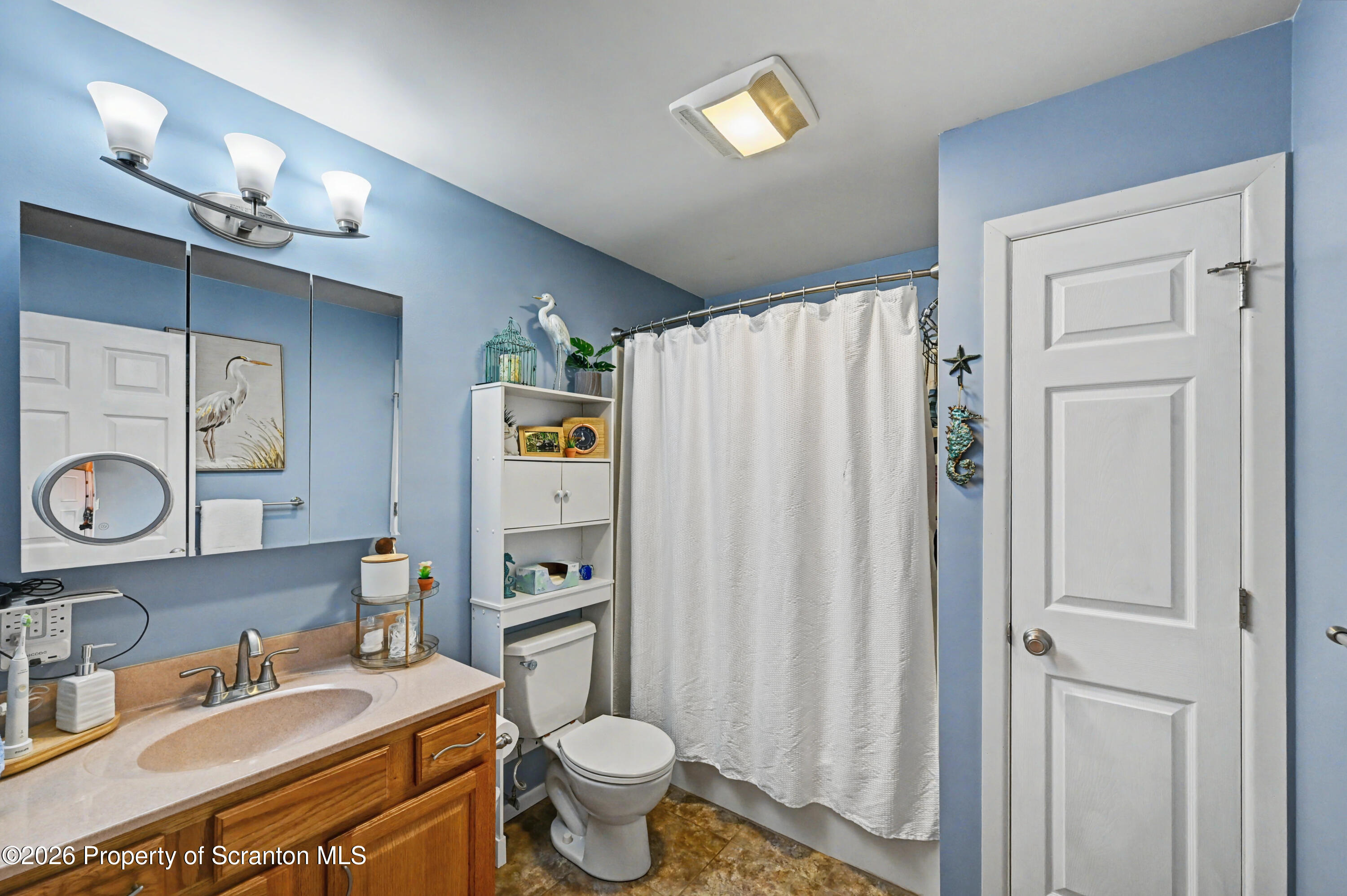 131 Front Street Jessup, PA 18434 - Photo 32 of 58 a bathroom with a sink toilet and shower