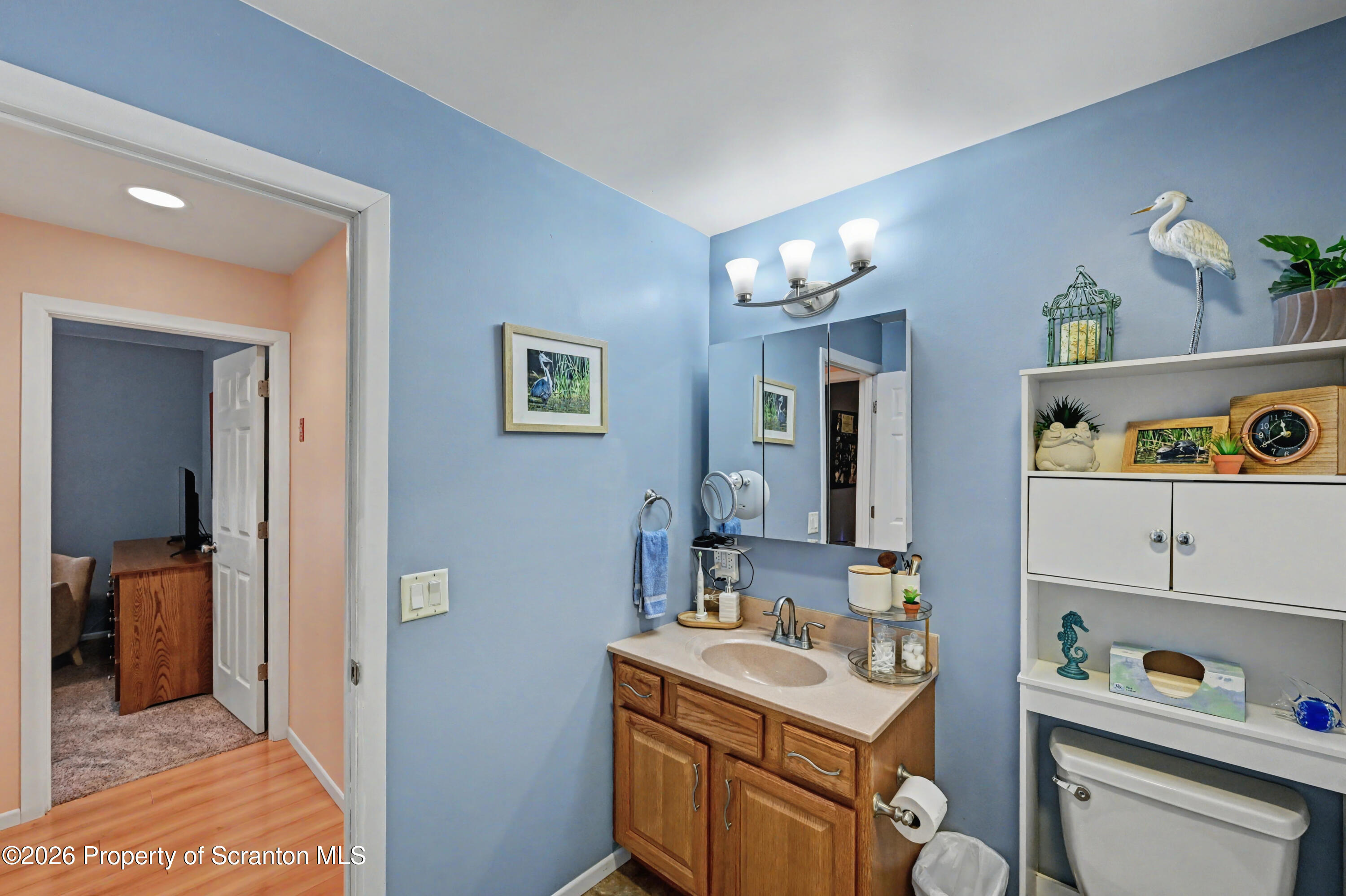 131 Front Street Jessup, PA 18434 - Photo 33 of 58 a bathroom with a sink vanity and a mirror