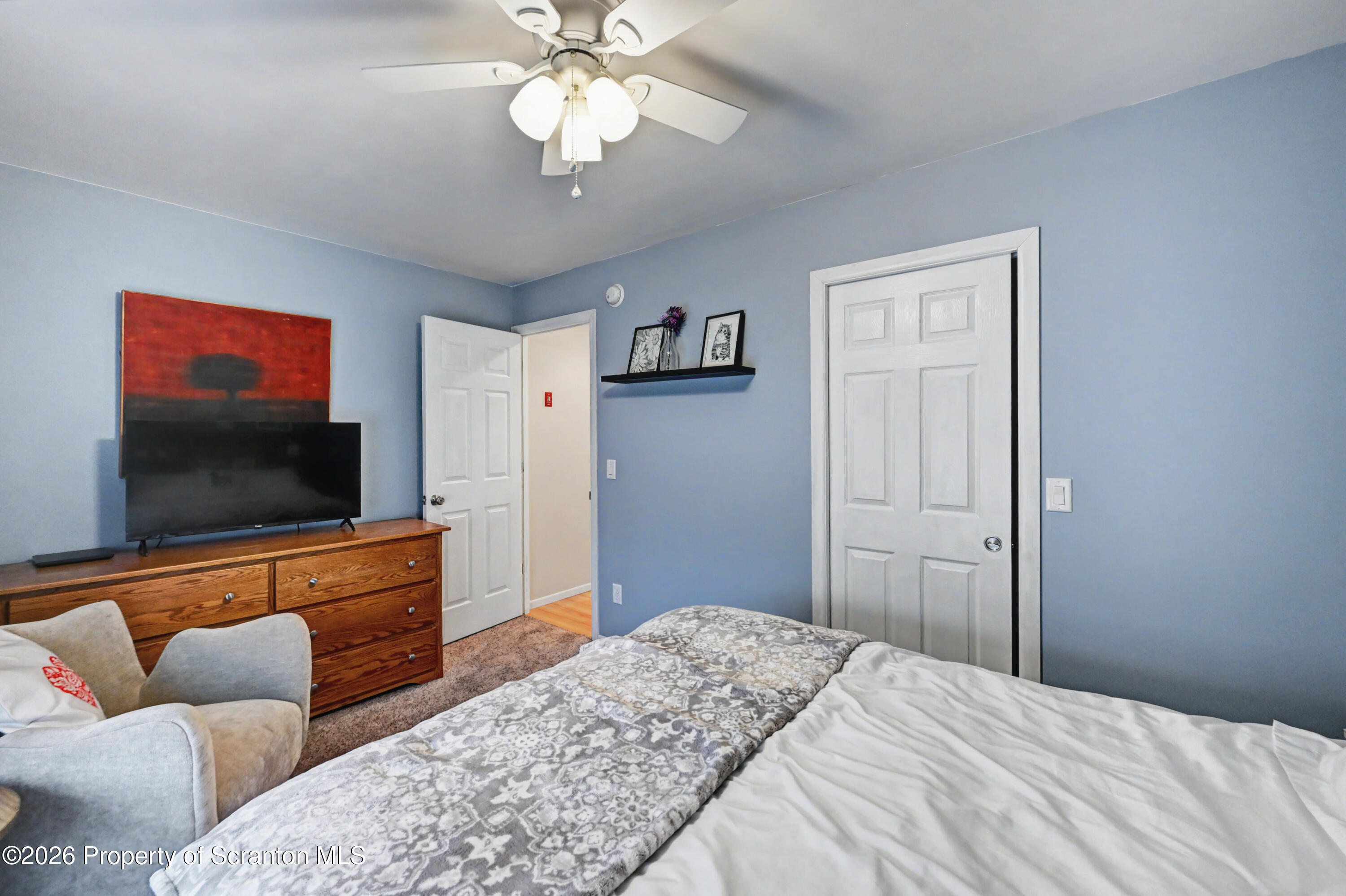 131 Front Street Jessup, PA 18434 - Photo 36 of 58 a bedroom with a bed and a flat screen tv