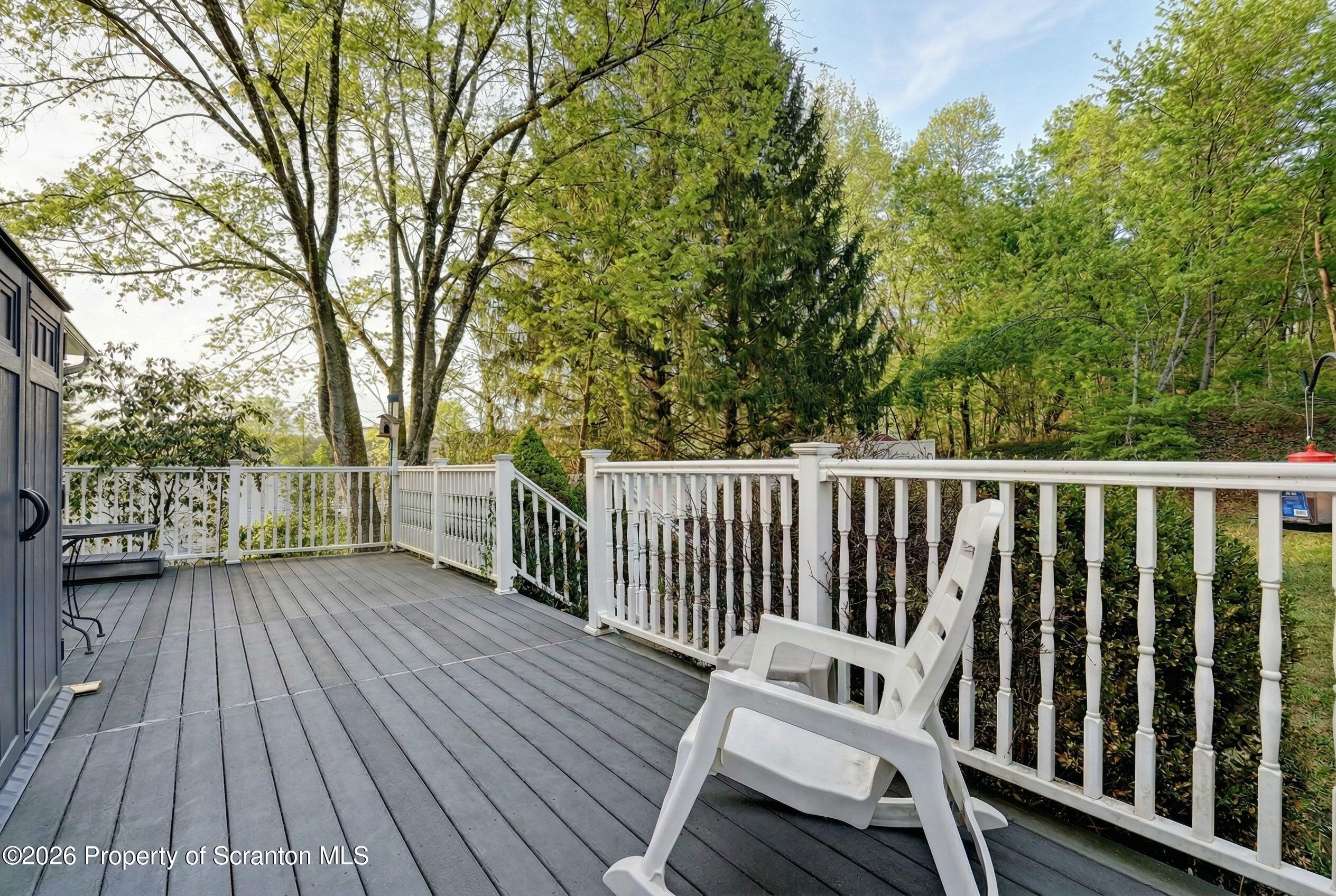 131 Front Street Jessup, PA 18434 - Photo 49 of 58 a view of a wooden roof deck