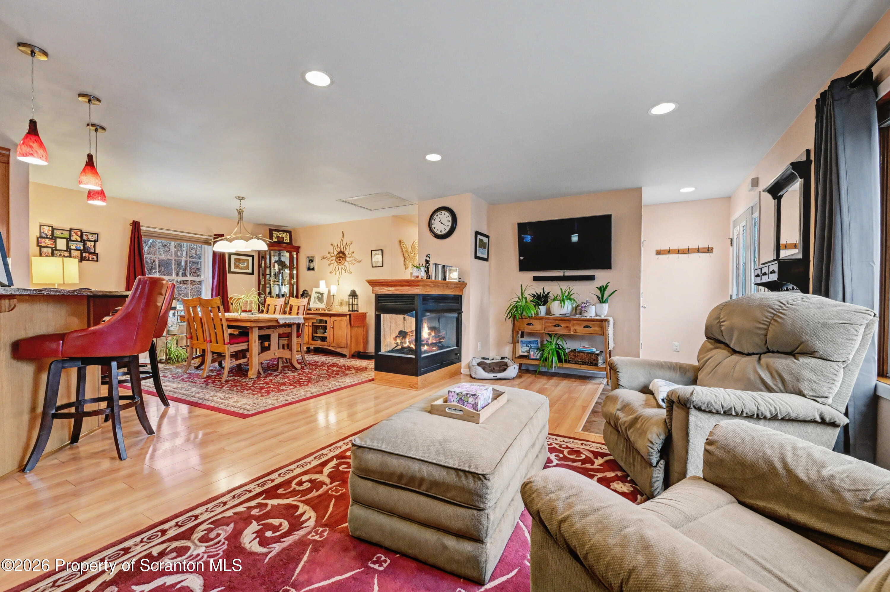 131 Front Street Jessup, PA 18434 - Photo 6 of 58 a living room with furniture and a flat screen tv