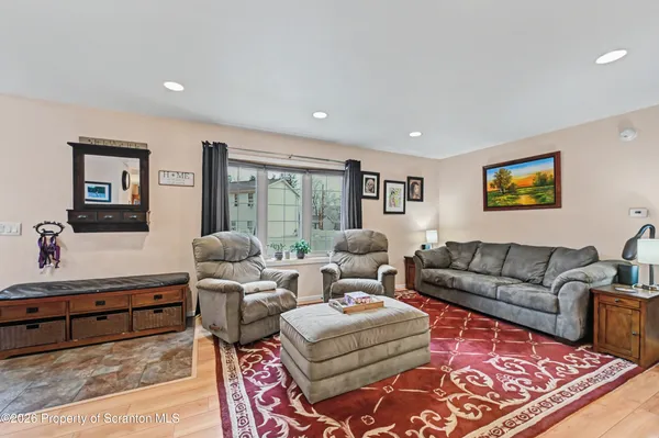 a living room with furniture and a couch