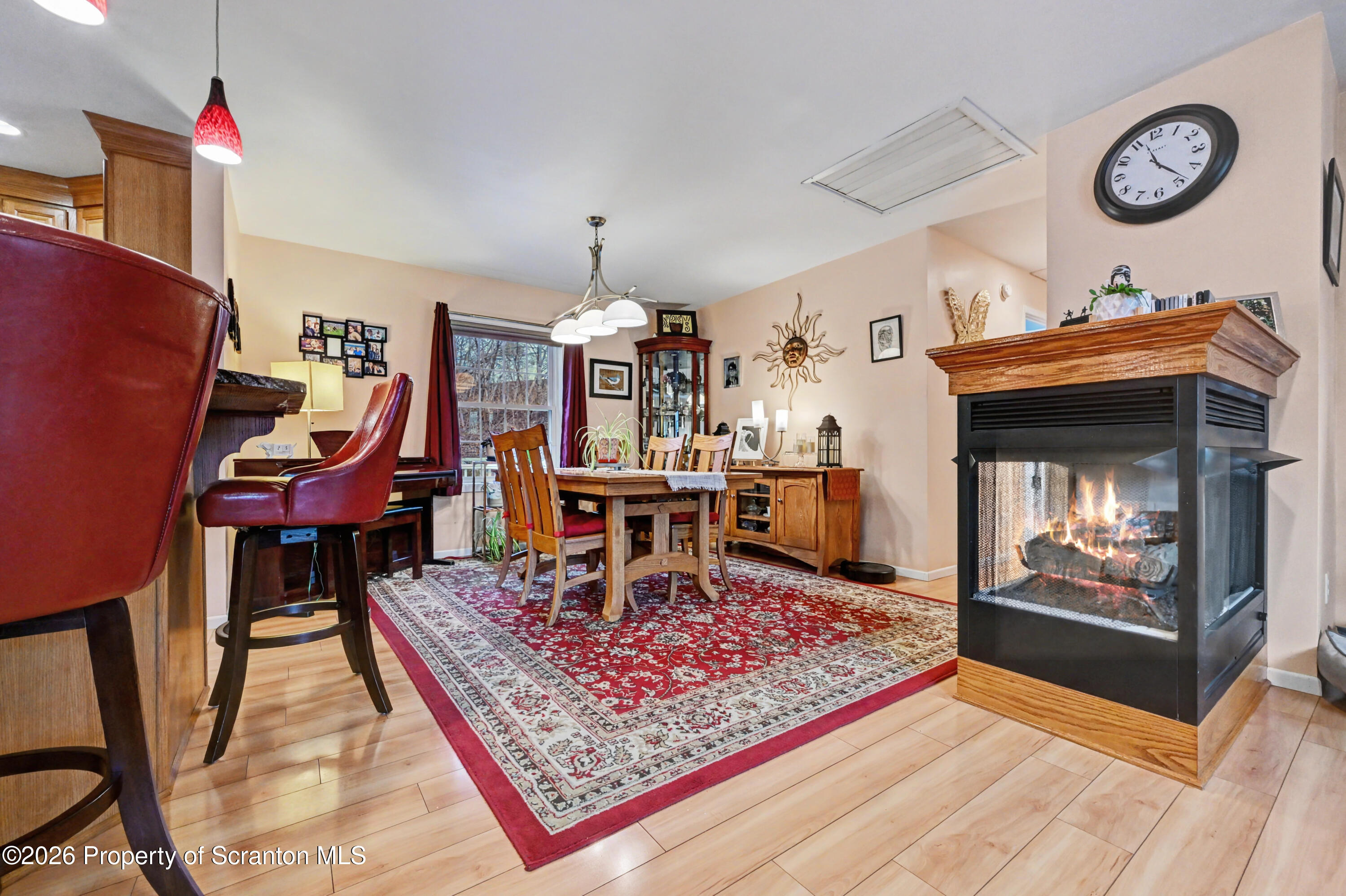 131 Front Street Jessup, PA 18434 - Photo 10 of 58 a living room with furniture and a fireplace