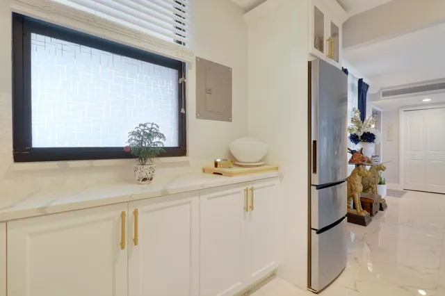 a view of a living room and dining room