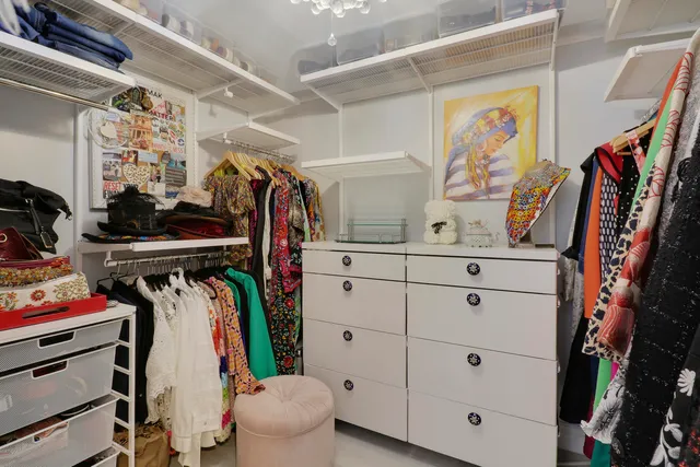 a bed room with a bed and a couch