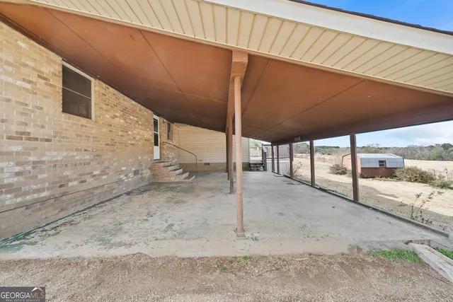 a view of a backyard of the house