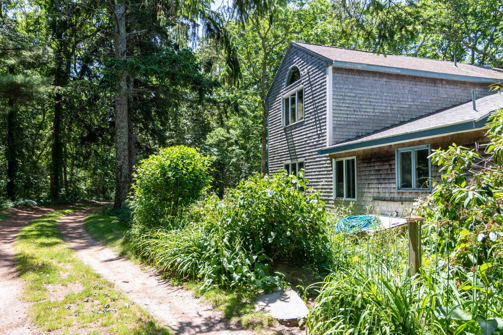 8 Trapps Pond Road Edgartown, MA 02539 - Photo 6 of 6 a view of a house with a yard