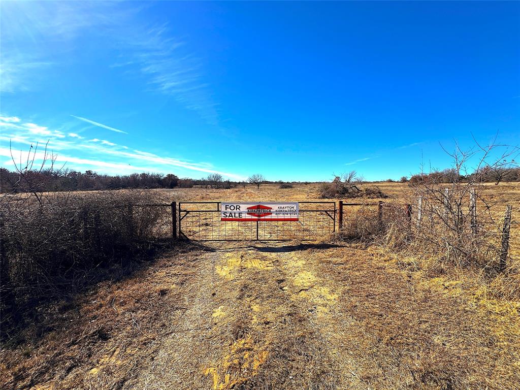 17101 Farm To Market 920 Poolville, TX 76487 - Photo 40 of 40 a view of a lake with houses in the back