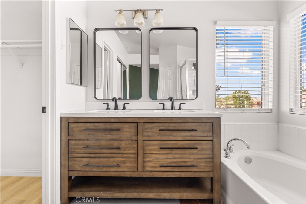 2 Cameron Circle Lake Forest, CA 92610 - Photo 15 of 45 a bathroom with a sink double vanity and a bathtub